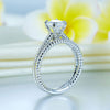 Double Twist Solitaire Ring